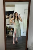 I bought this dress to wear on my anniversary trip with my husband. But I couldn't wait to wear it! It is my favorite dress I think I've ever owned to date. It's the perfect dress for spring and summer. It's a modest length, yet a little edge with the slit. The adjustable bow straps add a sweet touch. I wear mostly neutrals or blacks, so this dress is technically a little "out there" for me regarding color and pattern. However, it's a minimal dress that still makes a statement; truly a great balance. I love that I can wear it with heels to dress it up a little more, or dress it a little down by wearing my white platform Doc Martens.
I'm athletically built - larger butt and smaller chested so I often have to worry about things fitting well. This dress fit me perfectly. There is plenty of room for my hips to move and sit. There was a little room for me to grow in the chest area, but still very comfortable. I think the straps help make this a versatile dress for different-sized busts. - Karli T.