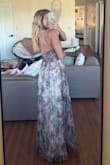 I got an xs in this dress and when came in it fit so well. I am a little bit short so I had to get about 3 inches hemmed off and I am wearing 3 inch heels but adjustments were easy to make. 
The ties in the back made it adjustable for my waist and made this dress fit perfectly.
I have a small bust, so I was afraid that that was going to be an issue but the cups don't overwhelm it there's only a little space. The material is a stiffer type of fabric, but it looks so good over the underskirt. It's a little bit darker than in some photos but that makes it even better for wedding, guests etc.. - Sierra W.
