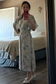 I'm so happy with this dress, the material is really good quality, well made, it feels even so romantic. I need only to wear a thin camisole in a complementary color to cover the v-neck. Plus the shipping was so fast like 3 days. - Lucia F.