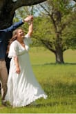This dress is a little heavy but so beautiful. I did my engagement pictures in this dress!! I loved the slit on both sides - Madison W.