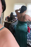 Dress is very long even with heels and I didn't have time to have it hemmed so I ended up clipping it to my waist lol The colour is super pretty, the fit is tight but not super tight so if you like that, then it is for you, if not, I also tried the XL and it just gave me a more loose fit. I don't enjoy feeling like I'm trapped in clothing and this size felt just the right amount of tightness. The back is really pretty and it felt confortable. I wore it to a wedding in a tropical destination and my legs were really sweaty when I had to stand in the sun because the fabric is dense but once the sun came down, it was okay. - Betty L.