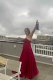 Loved this dresses! It is long, but I'm 5'11" and could wear heels with it! Awesome, vibrant color. Wore it to a formal event for grad school. Dress was fun and flirty without being too much for a semi-professional event. - Nina H.