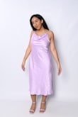 I love this dress not only because it got on time for the grad shoot but because it's my favorite color, Lavender!! The detailing of the roses is so seamless. I'm more on the flatter chest side so I had to pull the strings down to fit me better kind of leaving them loose at the top. The slit could show the leg a little more but it's still cute and it fits everywhere else well so I wouldn't trade this medium for a small one nonetheless. - Jailee M.