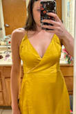 Fits perfectly in the waist, and just a little loose in the bust area (that is usually a problem for me tho). I would not change the size. I will say, the slit goes all the way up to the waist of the dress, but it wouldn't be a problem to safety pin that if you're going out on a windy day! As you can see, you'll want to steam it before you wear it! - Madyson B.
