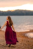 The dress and coloring is incredible. I bought it for engagement photos and it did a fantastic job.  My only complaint would be that it isn't made with the large busted in mind. The V-neck and back are stunning but do not provide support on its own for me to feel comfortable going braless, but finding a backless bra that didn't show on the sides or front was near impossible. - Alexis P.