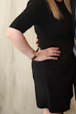 I wore this dress for an event and absolutely loved it. I wanted something a little more conservative, but with flare and that is 100% this dress. It was true to size and very flattering on me. I ended up buying it in blue as well as black. I know there is also a teal option, but that was sold out. Definitely worth buying this beautiful and flattering dress. - Nicole L.