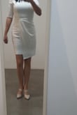 So I was going to buy black and end up choosing white, love the color. It makes it look so classy.
Size wise it fits a little tight but feel like if I size up it wouldn't fit as well. Also a little bit on the shorter size and you may have to use seamless underwear cause it's tight.
Got lots of compliments while wearing it, about how pretty and classy I looked. Honestly it can be used for an event or, like I did, to the office!
I uploaded photos on different lights.
*The shoes are also from Lulus and are amazing. - Ana M.