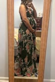 Beautiful dress! Currently 26 weeks pregnant and bought it for an event. I didn't end up going to the event but wanted to share how beautiful this dress is. I could have sized down to the large, but wanted to make sure I had room for the bump so I did an XL. I didn't have on shoes in this pic and you can see it's pretty long. I planned to wear a 3" wedge. It wouldn't have had time to get it altered, but the wedge brought it up enough. If you can handle a higher heel you should be okay. - Amanda C.