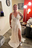 This dress is perfect and was everything I was looking for when it comes to my beach wedding dream dress. It's super classy, and not too extra. I'm a very down-to-earth easy-going bride and this dress met all my expectations. The pictures are not great but it still looks amazing and it's of me just trying the dress on! - Alexis T.