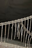 I kind of regret buying this as a final sale item. If you look at my pictures you will see that some of the rhinestones are sewn facing outwards and some inwards. It's cute and I bought it for Nashville, but I don't love how they are not all facing outwards to sparkle. - Vannyda K.