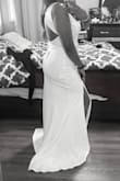The dress is beautiful but the front was slightly off center for me. I liked the material and shape. - Shyrin K.