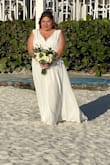 I love this dress. I bought it for my own beach wedding. I did have to take it in the bust, and the shoulders as it was a little too big on the top. From the waist down, it had a perfect flow. I did have to buy a 3X because they do run small. And I usually buy XL, so go 1 size up. The material is high quality. You will love it. I highly received it. I absolutely love my dress. - YENISEI P.