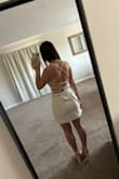 This dress fit really perfectly in the front and wasn't too short in the back. It's a really thick but stretchy material, and it feels very good quality. The only problem was at my lower back it needs to be taken in about 2 inches, but that's to be expected with my proportions and I am going to have it taken in. I have wider hips, so I go between small and medium in other brands, but I always get a size small from Lulus. - Hannah L.
