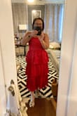 It's a very comfortable and pretty dress!! There's a stretch in it too!! - Lana S.