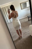 I wanted to love this dress, but the breast area is large with no support, the midsection was baggy, and the bottom fit nice but was almost too short. It just didn't work for me, I recommend it for a straighter body type. - Hannah L.