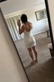 This dress was very flattering, and not too short. The only problem is it is pretty see-through. I'm going to wear it for my bridal shower! Not overly sexy for the older ladies that will be attending, but still very flattering, classy, and cute. - Hannah L.