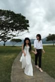 The fit was absolutely true to size, but was a bit too long for me. Was a very last minute dress (because my husband and I eloped in Hawaii!!) but it was fine, I held it up and you couldn't tell in pictures that it was too long. I am in love with my dress, and I am so happy that I ordered it! - Yuri S.