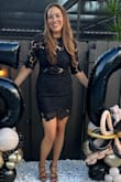 This dress was exactly what I was looking for , for my birthday. The dress has very to no elastic but medium fit perfectly. - Jeannie S.