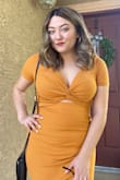 The color is beautiful, but I felt like it accentuated my belly a bit more than expected. Its a bit tight and It's also very long, it's supposed to be midi length, but on someone short like me it's to your feet. The top section is very cute. - Renatta M.