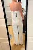 I loved this and it fit super comfortably, but the crotch was really low so I had to return it. The legs were tight enough that I didn't want to go a size smaller. - Tessa L.