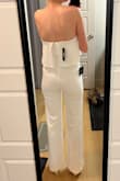 I LOVED this. It's so comfy and fit great and I and wanted it to work for my wedding luncheon, but the top just wouldn't stay up at all because of the wire V, so I had to return it. So disappointed. For reference, I tried a similar strapless jumpsuit from Lulus (without the V) and it stayed up perfectly. - Tessa L.