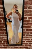 I bought this dress for my courthouse wedding. Super simple and elegant. I got so many compliments on the dress. The fit was perfect. I have more of an athletic build so sizing is ALWAYS a problem for me. I bought a size M and honestly was the perfect fit. - Angela Z.