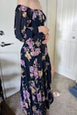 It's my favorite dress I've bought. I'm thin, tall, and hardly curvy and it fits like a (somewhat tight) glove. Fabric is flowy and nice, but you need tall heels to wear without hemming the cute flowy bottom. It's not breathable so it wouldn't be totally comfy in a hot and humid atmosphere. I went with XS based on the size recommendation--at first, I wasn't sure I would be able to close the top. With help, I can clasp it closed and it fits really well, but I think my shoulders/bust are wider than the XS is supposed to accommodate. Hugs the waist beautifully. The sleeves are beautiful but limit motion just slightly. Otherwise, I really love this thing. Can't wait to find every excuse to wear it :) - Kate H.