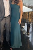 I love this dress so so so much! It fits perfectly, is comfortable and so elegant! The draping in the back and in the chest area is such a nice touch. Beautiful color as well. - Nicole M.