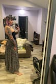 I love this skirt but it is much cuter on the model because it made me think the slit was up that high when really you have to unbutton some of the buttons to get it that high. Also, it's heavy so it will basically never show the skit open - Casey B.