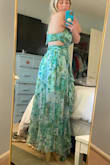 I am super pleased with the fit of this dress, the quality, and really overall happy with it. Wearing it to a wedding this summer and can't wait. Noticed someone saying the fit was off in previous reviews but I actually found it to be just right on me. The only thing I noticed is that the back smocked strap area has a little too much material (if I am nitpicking). Anyway, highly recommend it for the price and quality! - Molly S.