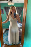 I was worried seeing reviews about this being small. I'm usually between a medium and a large. Size 10 in pants, but sometimes an 8 in dresses. I ordered a medium and It barelyyyy fit. Wouldn't zip with a bra on, but got it to zip without.
That said. I friggen love it. It is so soft and flowy and the chest feels super secure. My one complaint is that the seam in the center of the stomach is crooked! Other than that it's like a second skin and I can't wait to wear it! - Alexandra R.