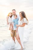 I purchased this dress for family photos on the beach but will definitely wear it again for the right occasions. It's not see-through, but is linen-like and flows nicely. There is a clasp at the top for more coverage if you want it. Flattering fit! - Kelly S.