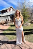 This dress fit like a dream! It was quite long but other than that, no complaints! - Leia M.