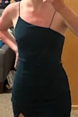 Dress was a tiny bit short on me; I'm wearing it to graduation and it looks absolutely fantastic in the pics but I do have to keep pulling it down since it rides up slightly and I'm tall to begin with. Super flattering colour, and the cut is unique (got a ton of compliments on it!) but just be aware that if you're above average height it's gonna be SHORT. Flattering for a smaller bust size, and the slit means it can accommodate hips if needed. - Danielle V.