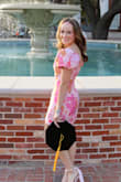 This dress is structured so well and the color was perfect for spring graduation photos. Only thing I would pay attention to is how short it gets when you sit down. - Katie S.