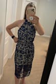 Absolutely love this dress, it's exactly as pictured online and great quality, fabric and all around beautiful dress!! - Sara V.