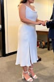 I bought this dress for my civil courthouse ceremony. I went outside of my comfort zone and picked a dress with spaghetti straps. Once I tried on the dress, it made me feel so beautiful and felt like a bride! The fabric was comfortable, not see through and has adjustable straps. 10/10 recommend! - Leisi C.