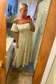 I bought this dress in an XL- it fit great but realized the top part was a little big when I sat and crossed my arms there was a gap. 
So I ordered the large and it's tighter in the front part. However, I have a lower apron belly and a smaller waist. I reeeeally dislike my arms as well. This dress hides everything I'm insecure about and perfect for a summer wedding! I am personally in between sizes so I need to either alter the XL or settle w the large. Downfall w the large is the sleeves are a tad shorter to hide my arm pudge. But I loooove it so much! Worth every penny! - Jessica S.