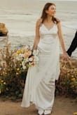 I ordered this dress for my wedding after I decided I didnt love the one I bought from a bridal store. I usually order a small but saw a ton of people my size ordered xs and Im so glad I did it fit like a glove! I cant believe I got it for the cost it was and got soooo many compliments. The low back and train and satin is perfect. It obviously needs steamed but I steamed it myself and it came out perfect. - Callista V.