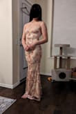 Another great dress. We ended up not keeping it because my daughter can be rough on dresses and this one has many beautiful delicate sequins. We liked the adjustable straps, the rose gold color, the glitzy look. The wearer is 5 ft 7 3/4 in and the length of the dress is perfect. - Lidia R.