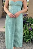 Wore this to my sister's wedding in AZ and got lots of compliments. The top doesn't have much stretch and I did have to wear a certain bra to make it more comfortable. I usually go braless but because of the stitching, my boobs looked weird without the bra keeping the fabric in place - Devon P.