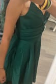 I've been looking for a good dress for a wedding I'm attending and this dress is amazing it's just like the picture and everything. The shipping is super fast too! The material is also pretty good definitely worth it. - Iwalani O.