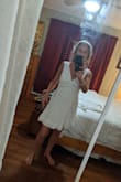 This simple white dress is flowy and soft yet has classic appeal. Perfect for a spring soiree. - Tasha G.