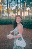 This dress fit amazing and I am big chested but still didn't need to wear a bra. it was super supportive and flattering. I got it altered because I am on the shorter side and absolutely loved it. Perfect for a spring or summer wedding and got lots of compliments! - Jamie G.