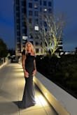 I ordered this dress in an xtra small and it fit perfectly. It was a teeny bit too long but it draped beautifully when standing. This dress was so elegant and comfortable. I absolutely loved everything about it! It was delivered before the delivery date. Which was a plus. - Jeanene C.