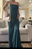 I rarely buy dresses, but when I do I'm very picky and indecisive with what looks good on me. This dress is stunning and I'm very happy I had the choice to fill out a mini survey so I could get my recommended size.
It does come a bit too large but I don't mind it as I will be sitting and standing throughout the day. I bought this dress for a formal wedding event. It even came 4 days early!! Buy it!! - Monica S.