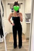 Great jumpsuit! Awesome find on sale too. Though I normally wear a size S in all clothes on this site I think the XS is still workable on my frame. (S and M were sold out) I hope they bring this one back in more colors, I'd love a purple or black one!
The green velvet is very dark which is actually perfect since I was having trouble finding a black jumpsuit that I liked. Looks beautifully green in bright light though. It's also double lined which is great. Velvet is usually a winter fabric for some reason but is totally freezing to wear lol so that'll help if I wear to Christmas parties, etc. Good chest support and fit too, no need for a bra, or could get away with a bandeau if you want.
I always need to get things hemmed due to my petite stature, so if you're on the shorter side you will too. - Alix B.