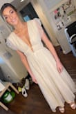 I recently wore this dress to my bridal shower and it was an absolute showstopper! I received endless compliments throughout the day and felt like an absolute princess in this stunning dress. First off, the cream Swiss dot fabric is so elegant and feminine. The delicate texture of the fabric is simply beautiful, and the ruffles add just the right amount of sweetness and romance. The midi length is also perfect for creating a chic and sophisticated look. What I love most about this dress is how comfortable it is to wear. The fabric is lightweight and breezy, which makes it perfect for warm weather. Plus, the lining ensures that it's not see-through, which is always a concern with lighter-colored dresses. The fit of the dress is also amazing. The cinched waist and flowing skirt are so flattering! Overall, I would highly recommend the Yours Evermore Cream Swiss Dot Ruffled Midi Dress to anyone looking for a beautiful, comfortable, and elegant dress for a special occasion! - Debbie S.