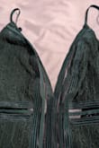 I'm pretty sure this was used and returned. Looks like it may have been washed and the white straps on the inside were cut off. - Amber T.