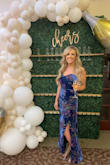 This dress came in within 2-3 days. Love the quick shipping. It fit so perfect. Wish I would've worn a push up strapless bra with it for fullness. I wore it in the month of April and it wasn't too hot or too cold. The material was stunning and I would definitely wear it again. - Samantha S.